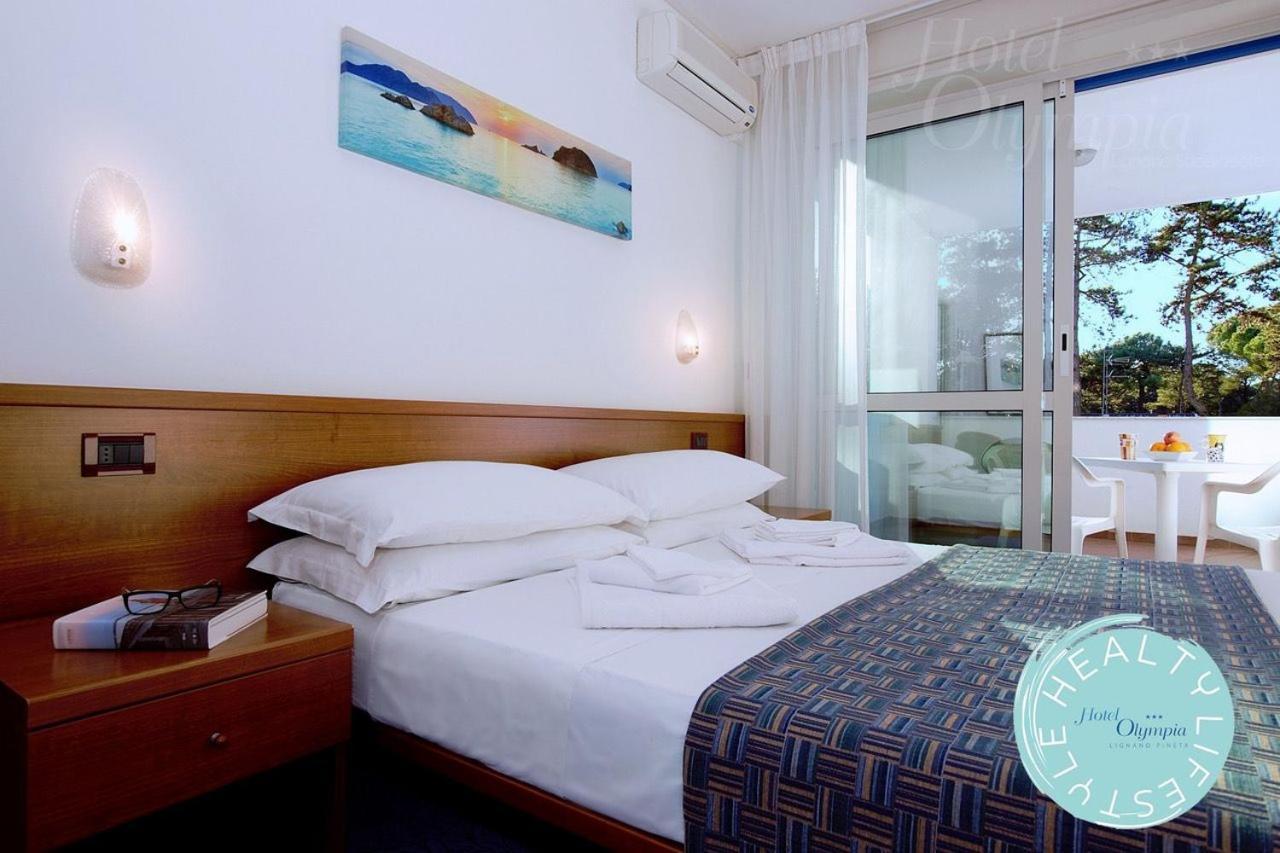 Hotel Olympia Lignano Sabbiadoro Bagian luar foto