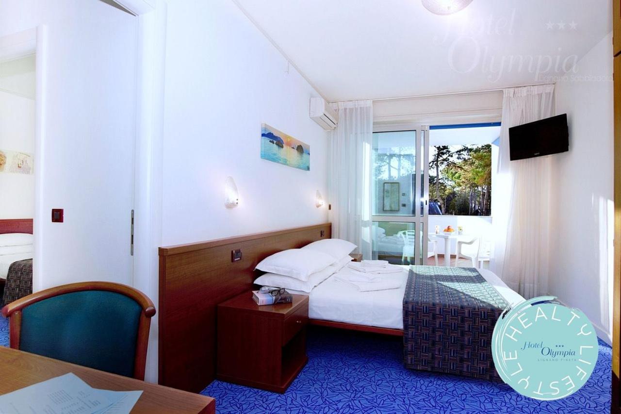 Hotel Olympia Lignano Sabbiadoro Bagian luar foto