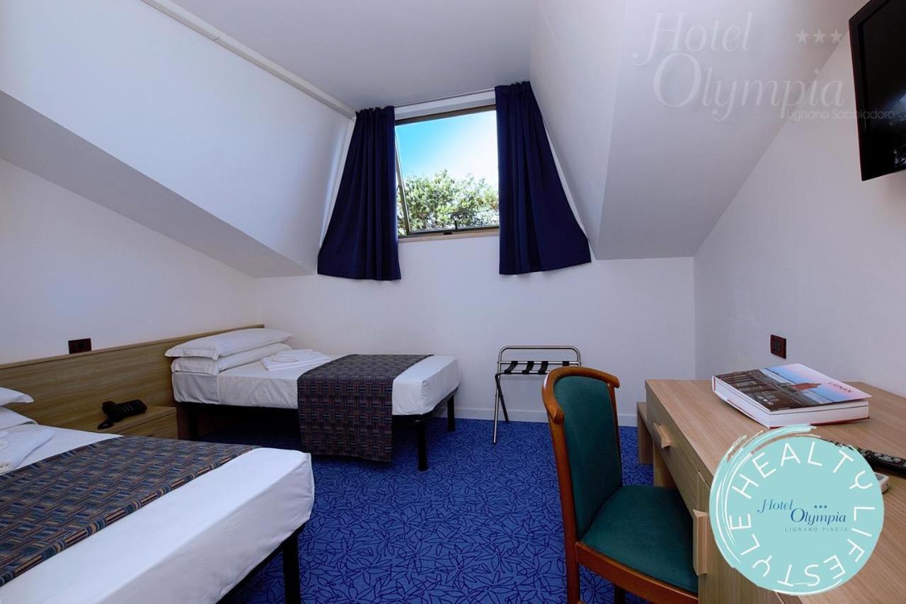 Hotel Olympia Lignano Sabbiadoro Bagian luar foto