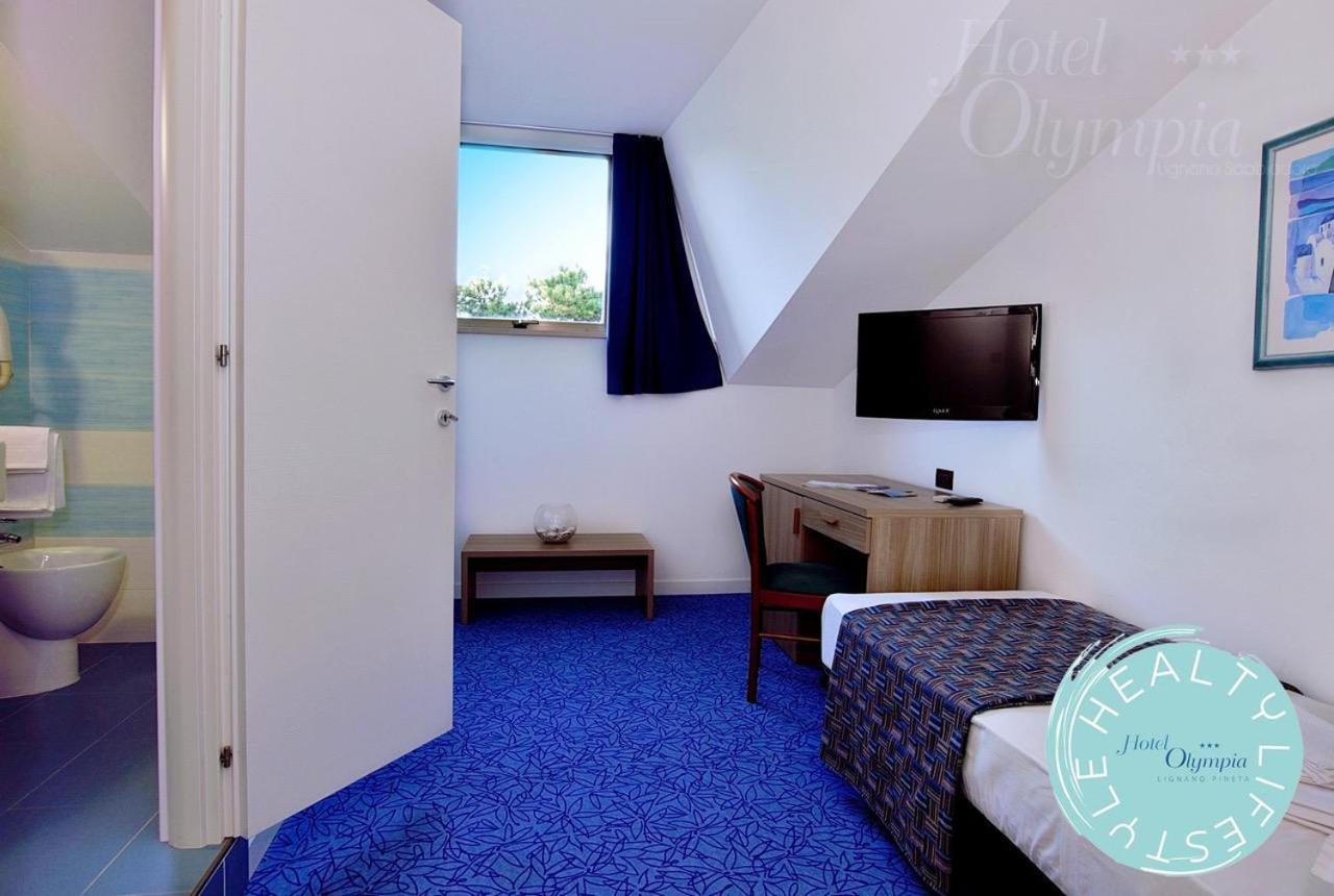 Hotel Olympia Lignano Sabbiadoro Bagian luar foto